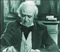 Alastair Sim as Ebenezer Scrooge